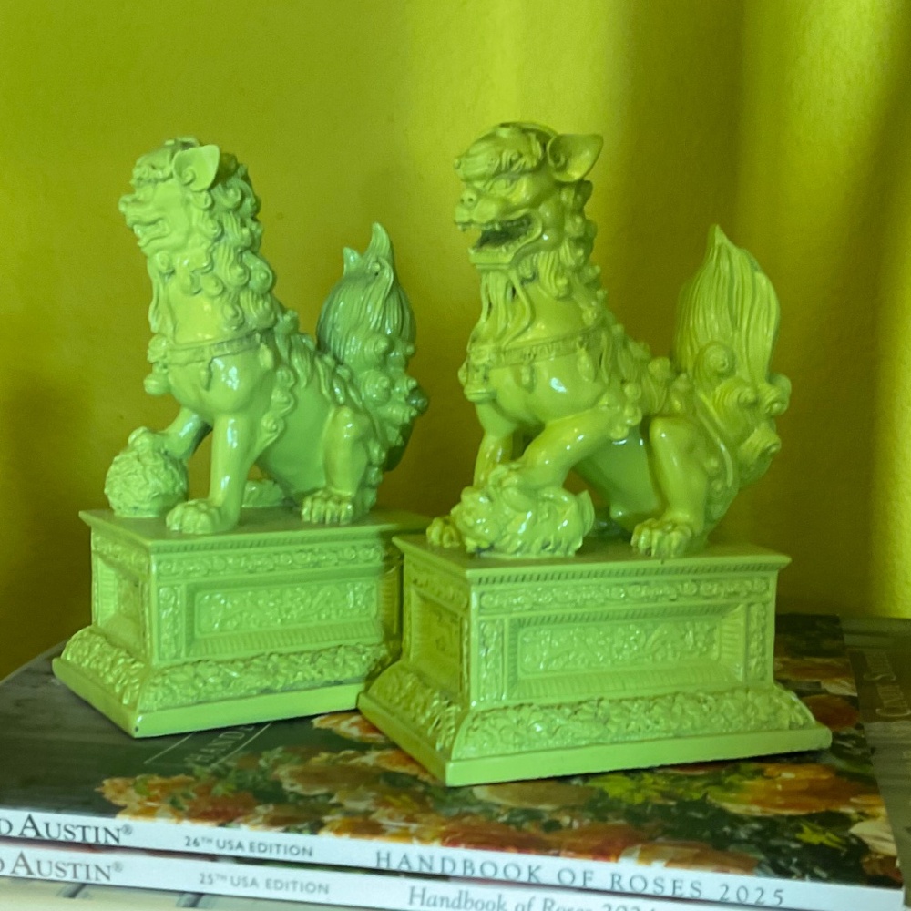 Pair of small foo dogs in bright green